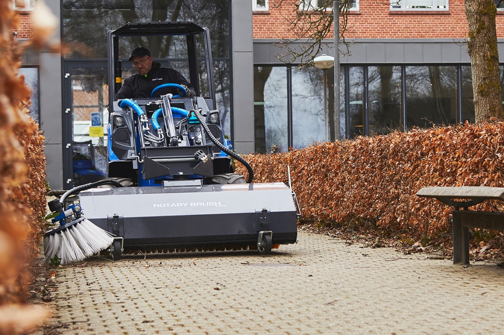 EZ8 sweeper cleaning a side street