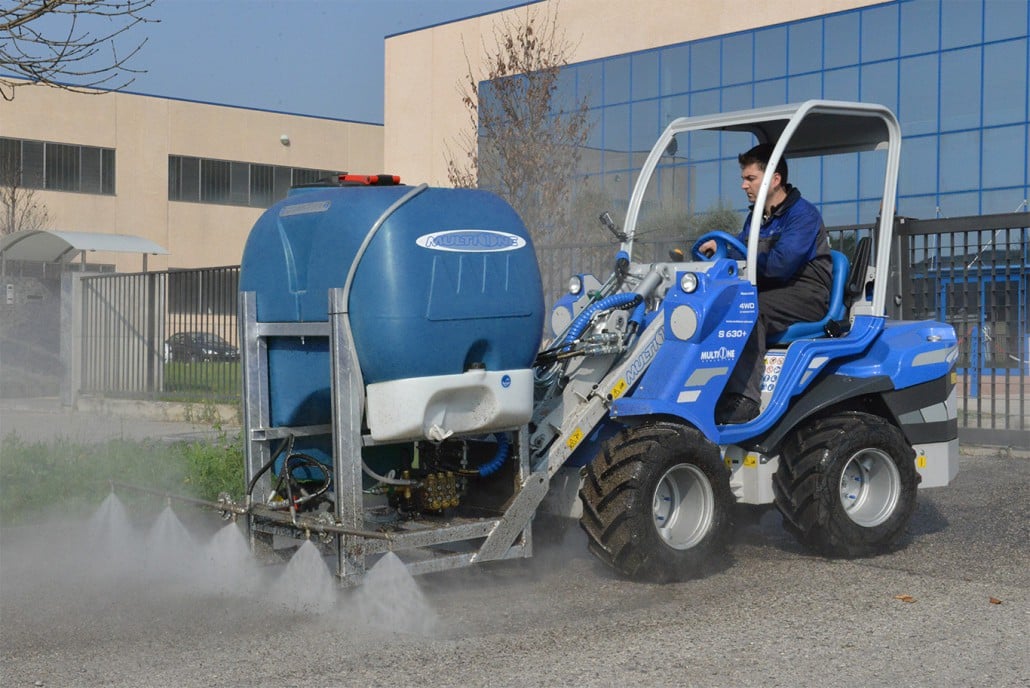 street washer cleaning a street