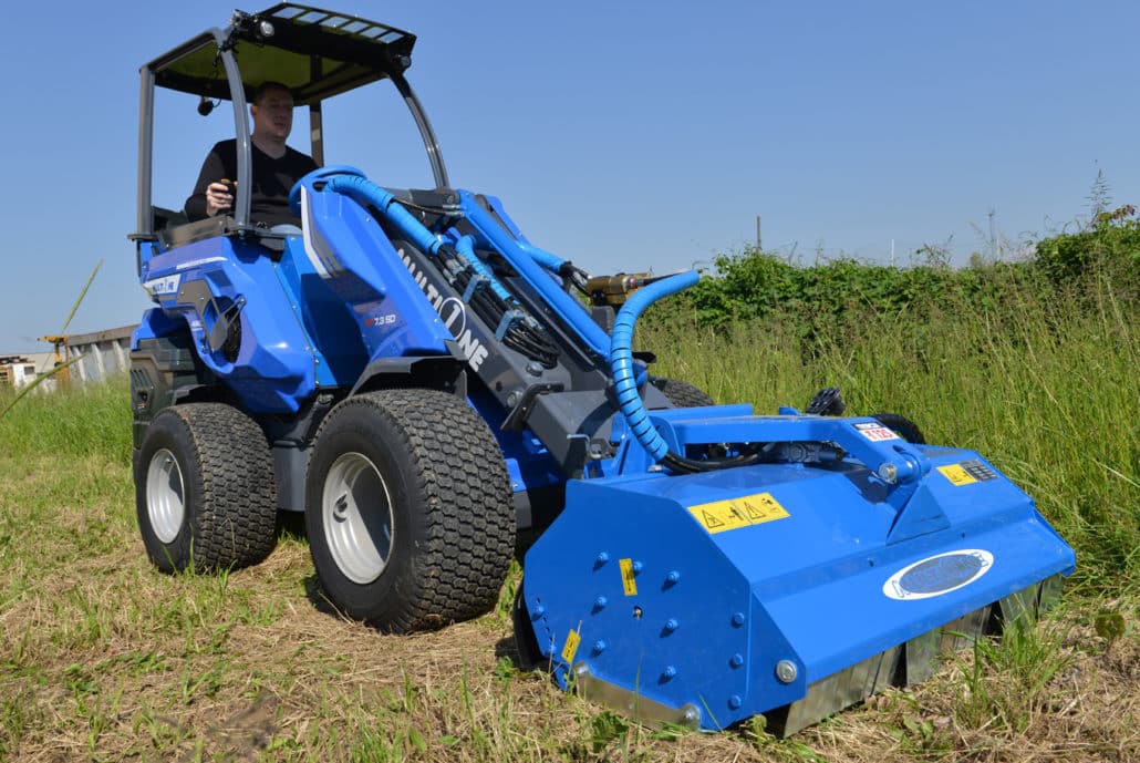 flail mower cutting grass