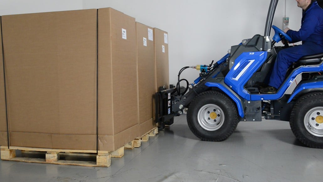 pallet fork with side shift moving cardboxes