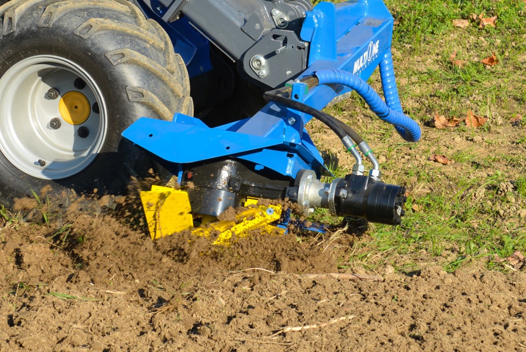detail of a power plough in action