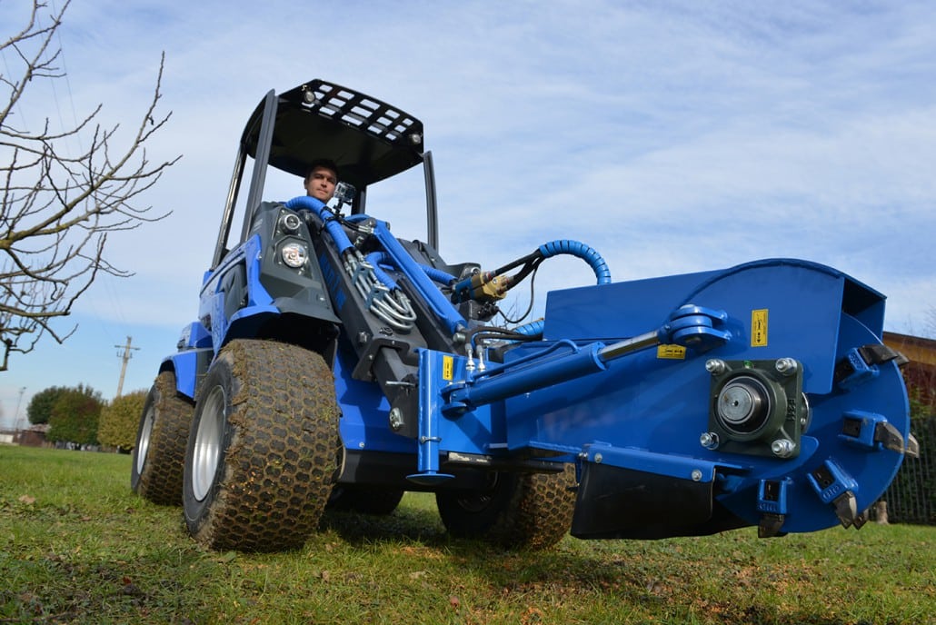 swing stump grinder seen from below