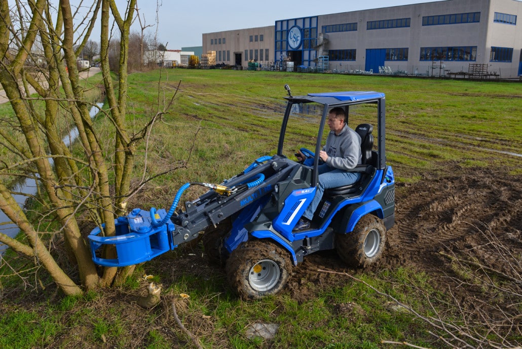 tree shear cutting down trees